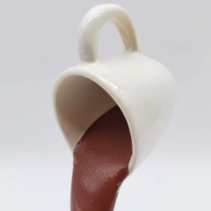 Floating Spilling Coffee Cup Sculpture