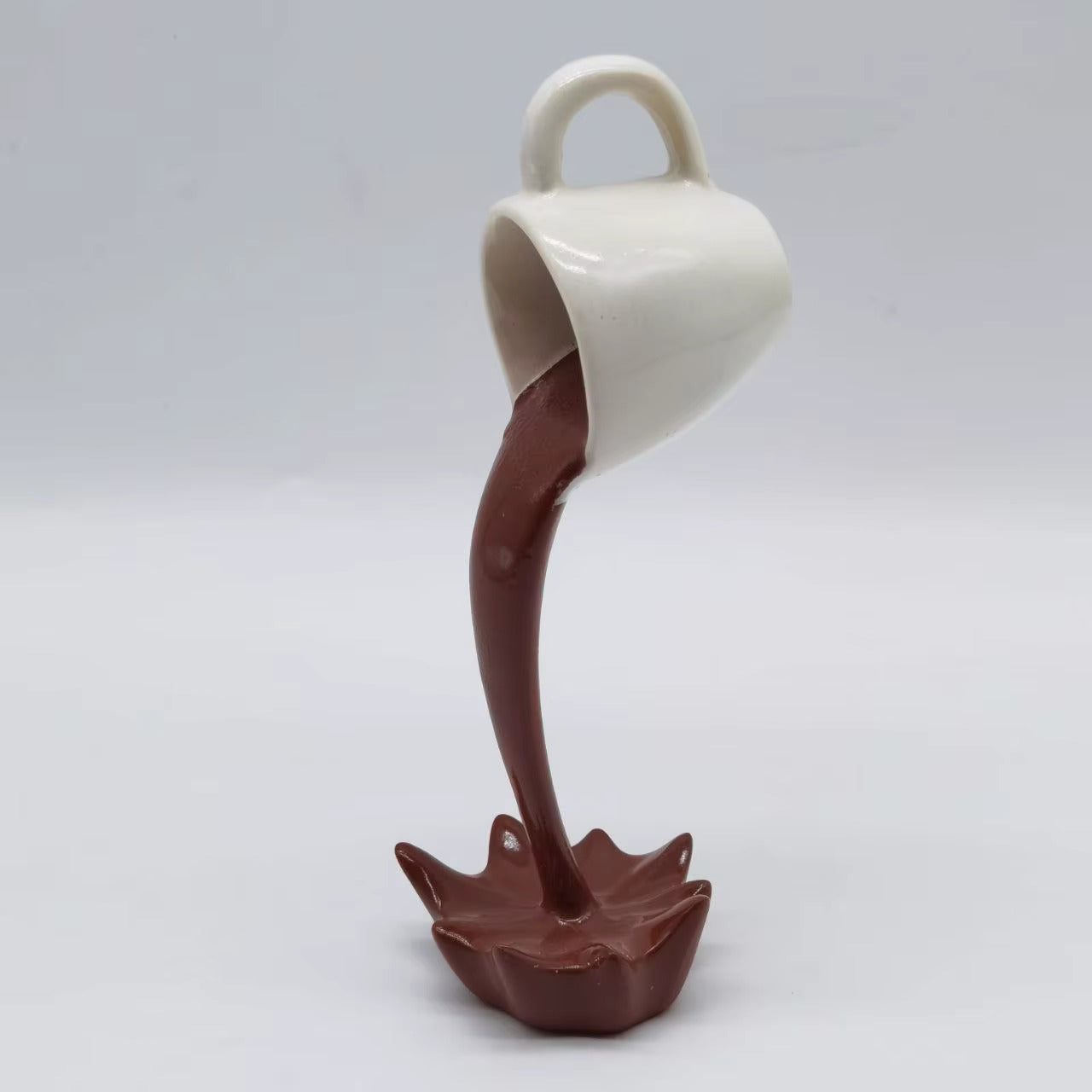 Floating Spilling Coffee Cup Sculpture